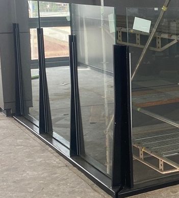 Metforce Semi-Frameless steel and glass balustrade with powder coated fin posts and glazing channels, Perth