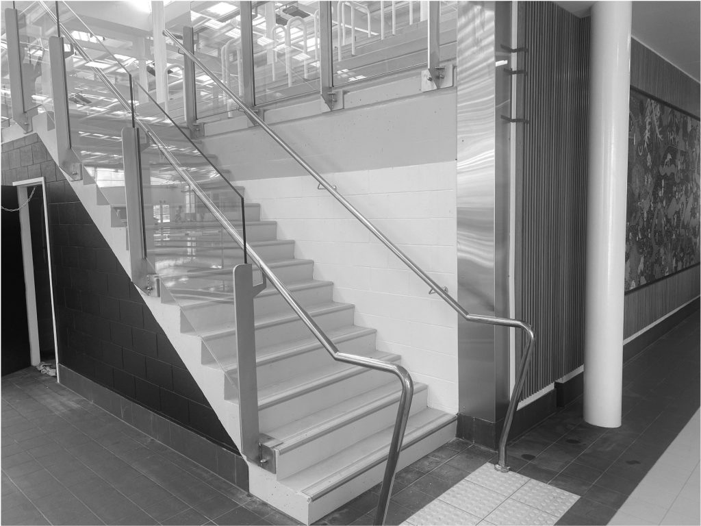 Metforce Semi-Frameless stainless steel and glass balustrade with fin posts and glazing channels, Perth